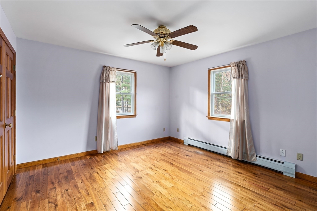 1 Plain Street Easthampton, MA 01027 - Photo 31 of 41 wooden floor in an empty room with a window