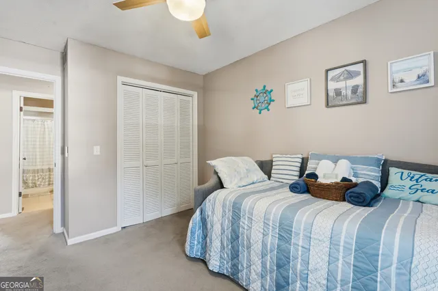 a view of a chair and table in the patio
