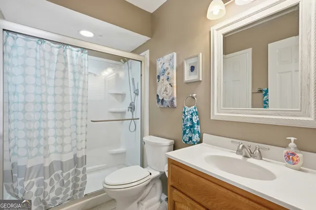 a view of a swimming pool with outdoor seating