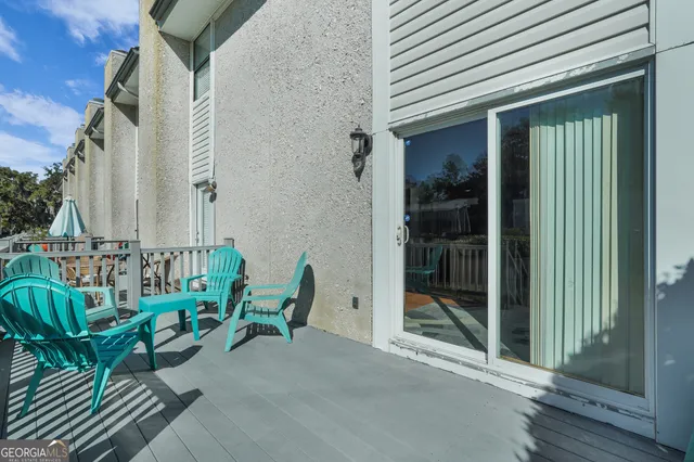 an aerial view of a house with outdoor space