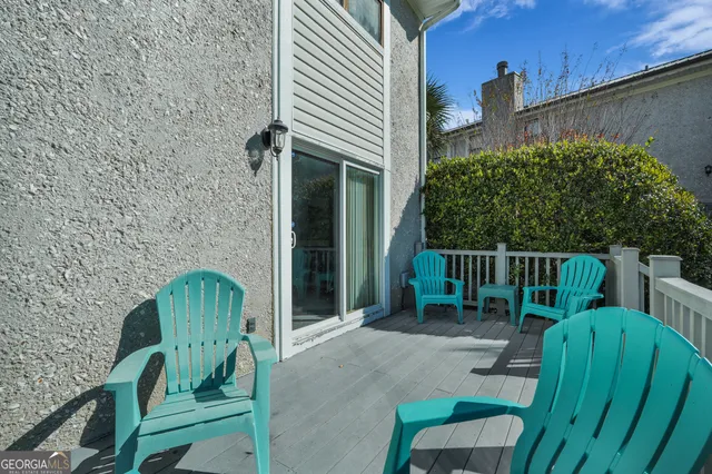 a aerial view of a house with a yard and garage