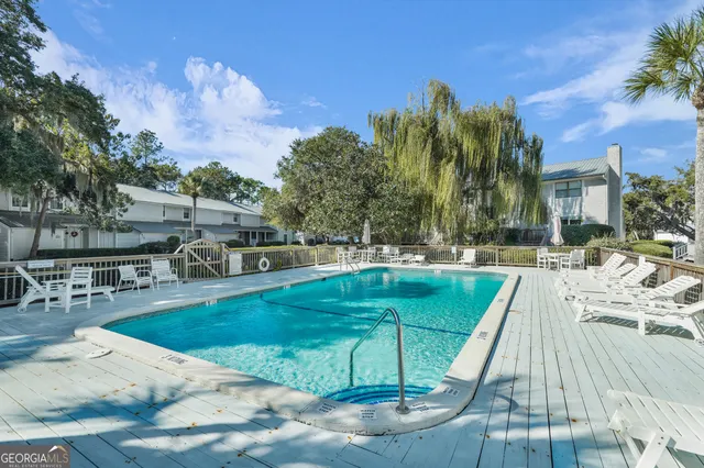 an aerial view of residential house with outdoor space and river
