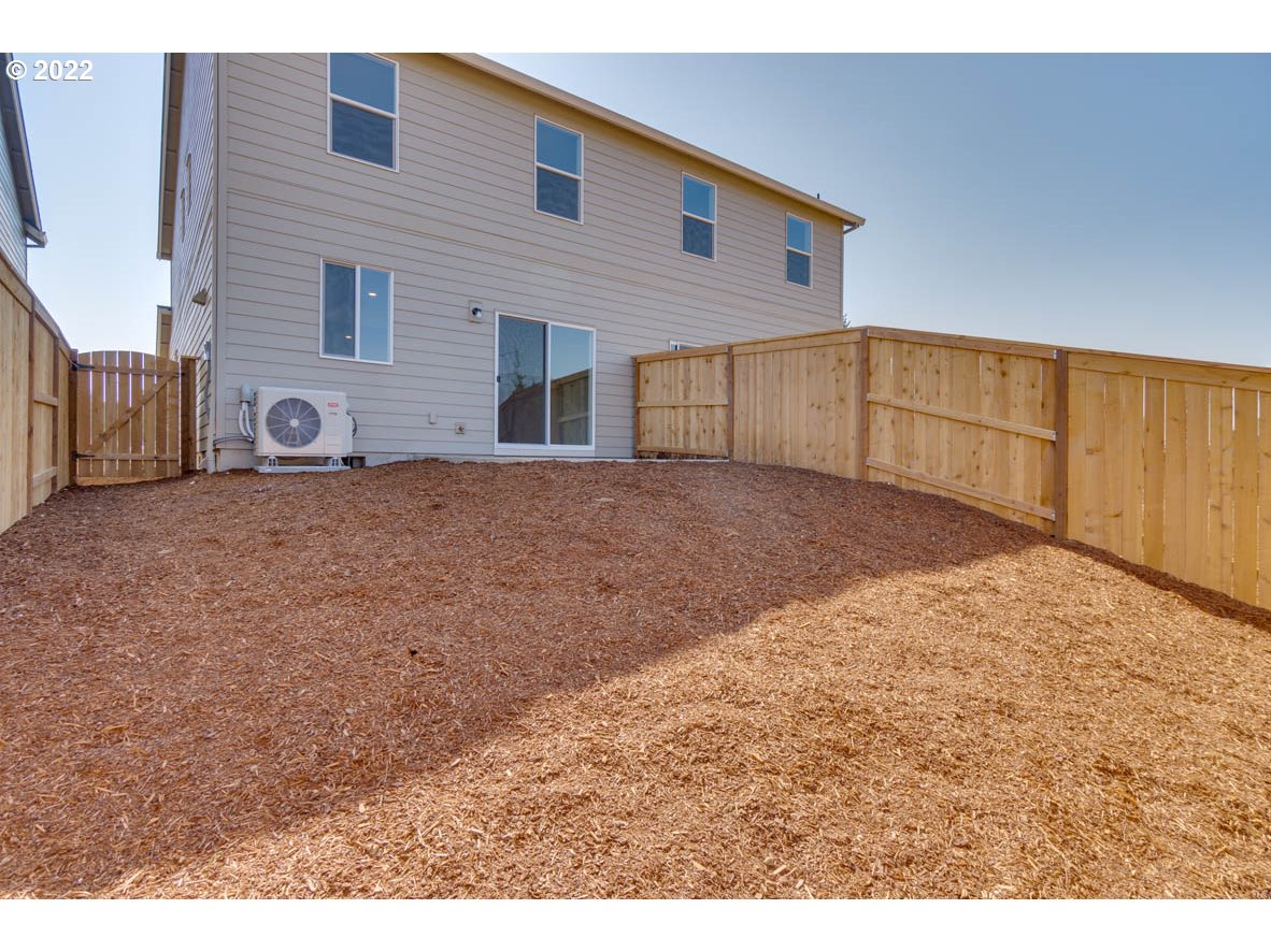 2803 North 2nd Way Ridgefield, WA 98642 - Photo 13 of 18 a view of a backyard of a house