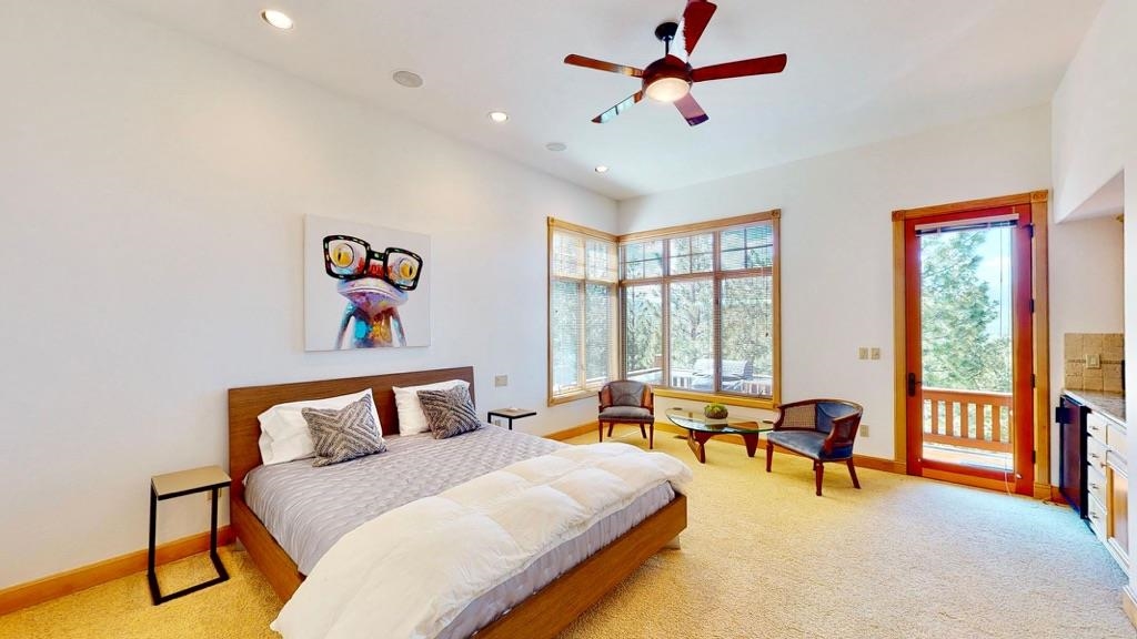 759 Red Sky Clio, CA 96106 - Photo 11 of 21 a bedroom with furniture and a large window