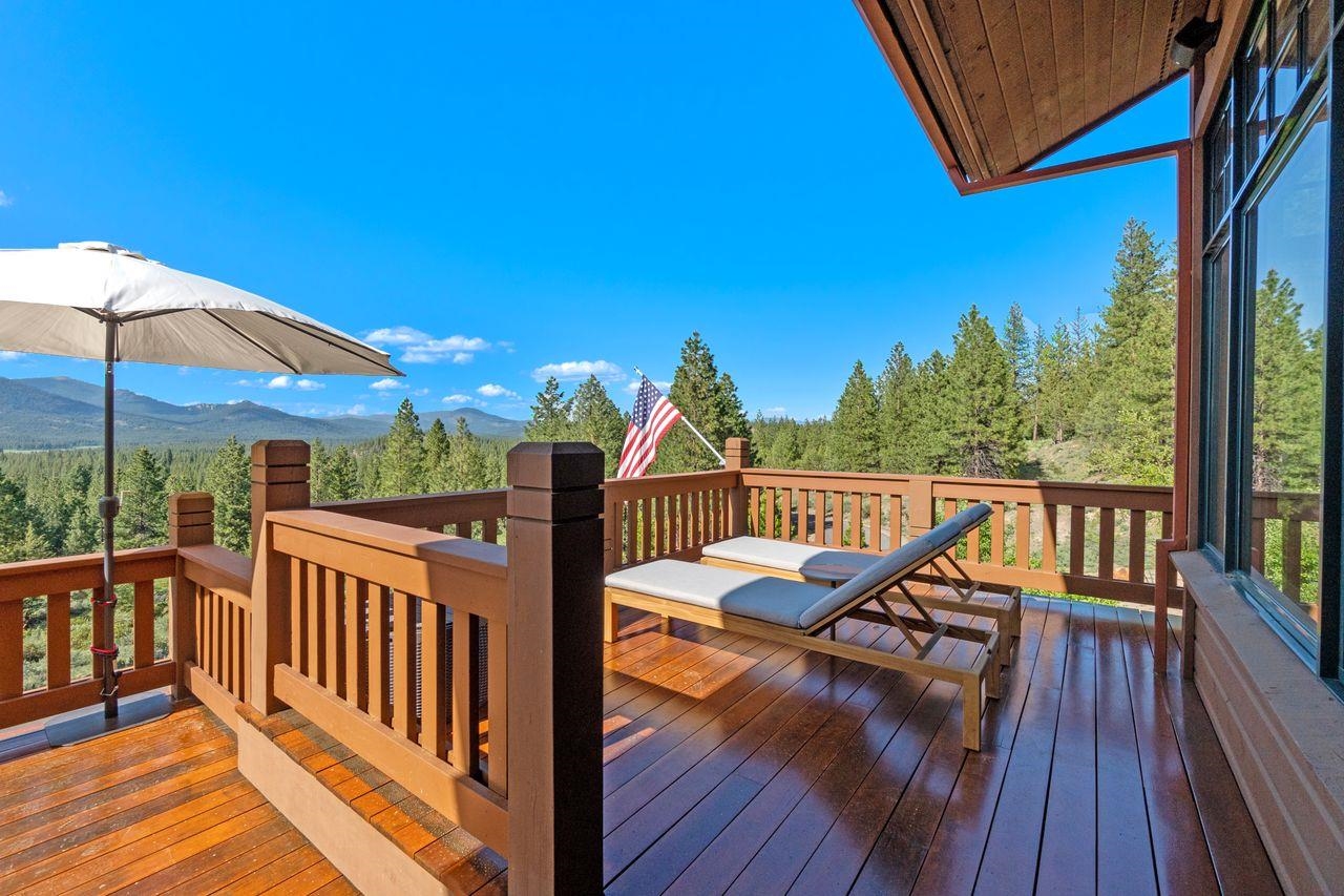 759 Red Sky Clio, CA 96106 - Photo 17 of 21 a view of a balcony with wooden floor and outdoor seating