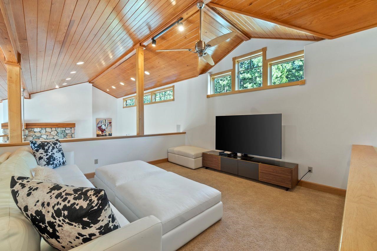 759 Red Sky Clio, CA 96106 - Photo 10 of 21 a living room with furniture and a flat screen tv