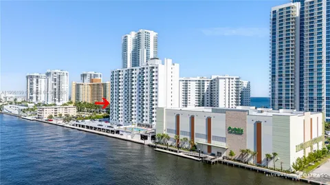 a view of ocean view and tall buildings