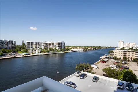 a view of a city skyline from a lake