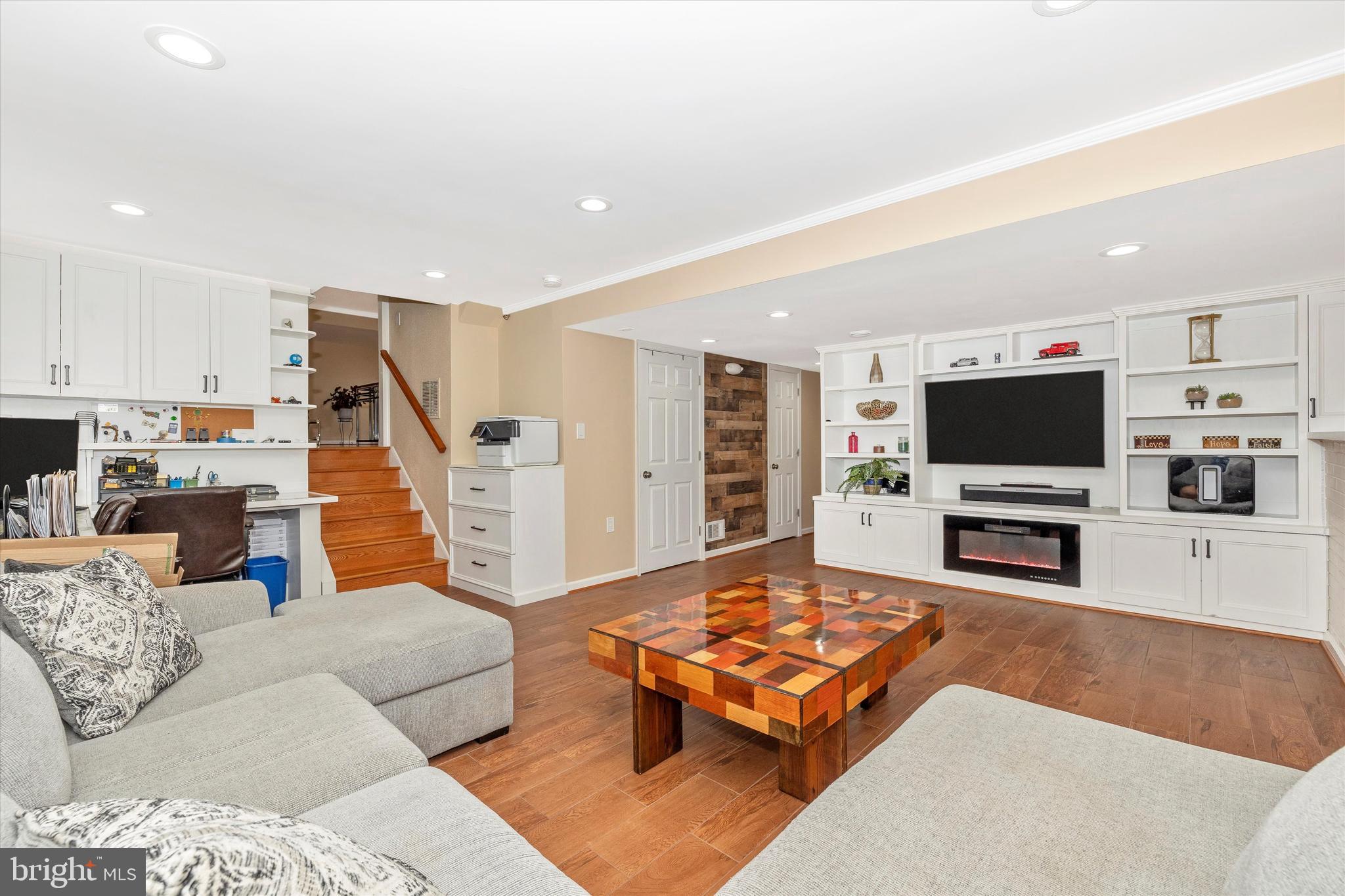 10319 Bloom Drive Damascus, MD 20872 - Photo 22 of 42 Other view of lower level with fireplace!