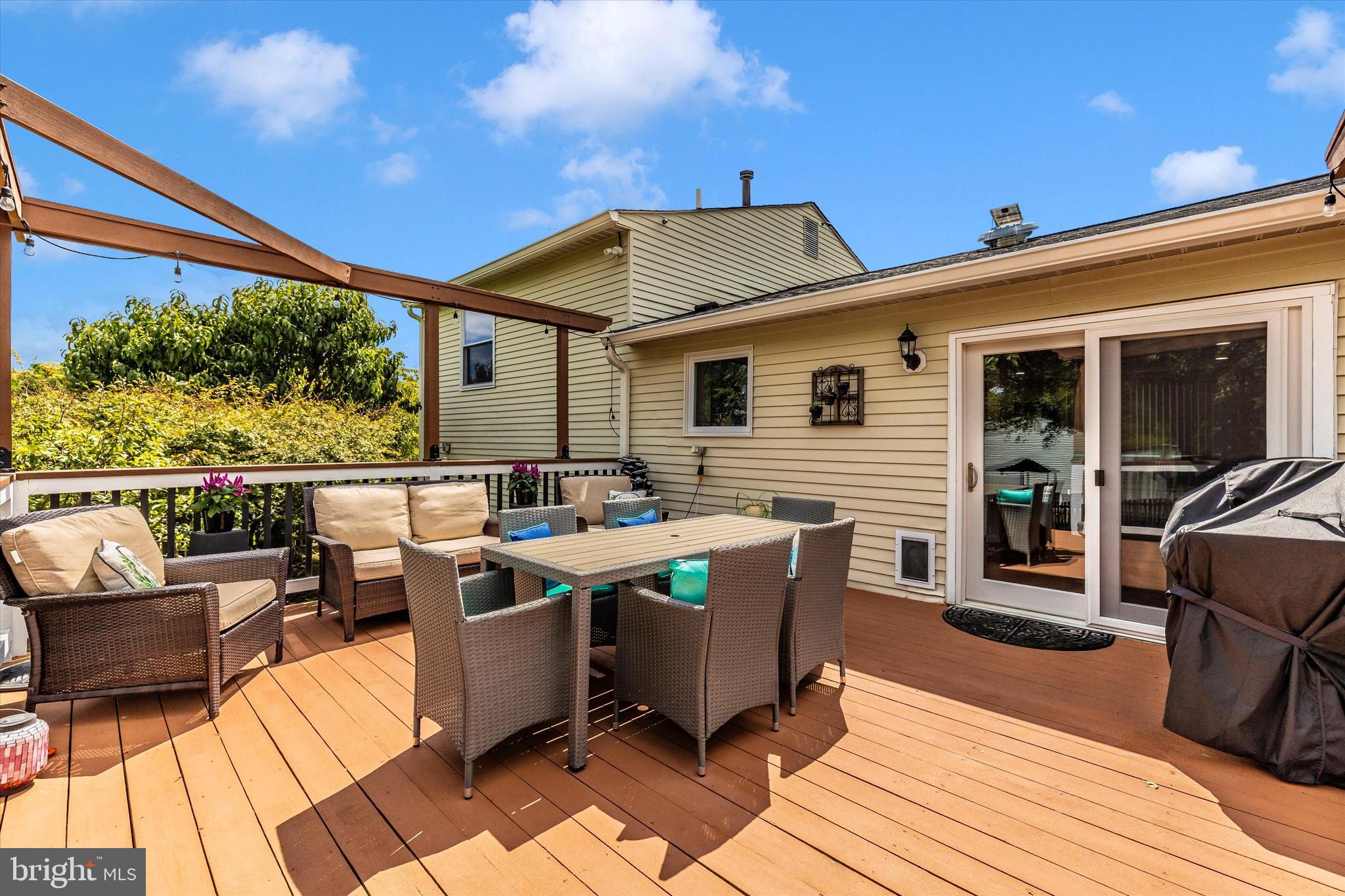 10319 Bloom Drive Damascus, MD 20872 - Photo 36 of 42 Large deck with pergola