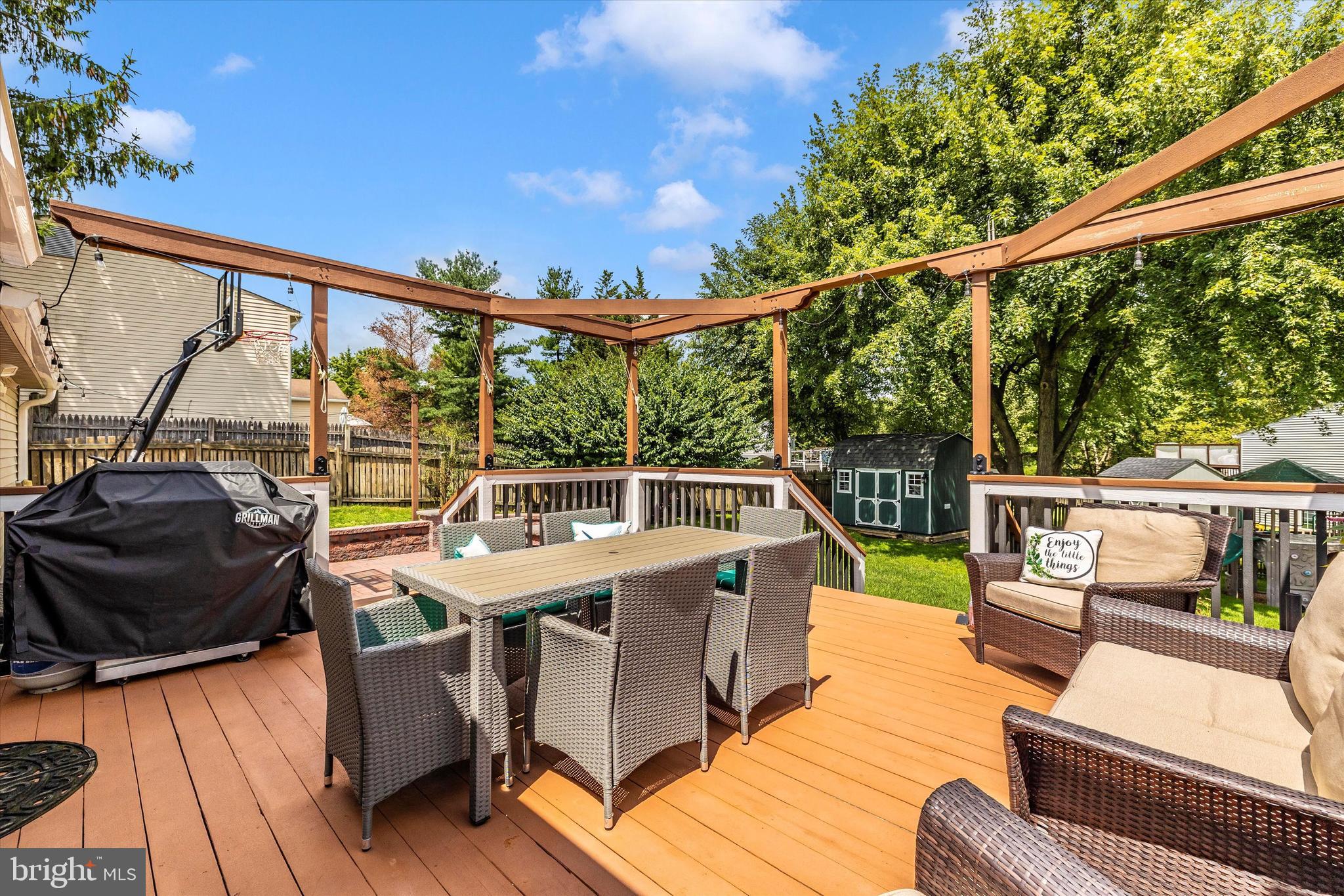 10319 Bloom Drive Damascus, MD 20872 - Photo 37 of 42 Pergola has bamboo shades for privacy too!