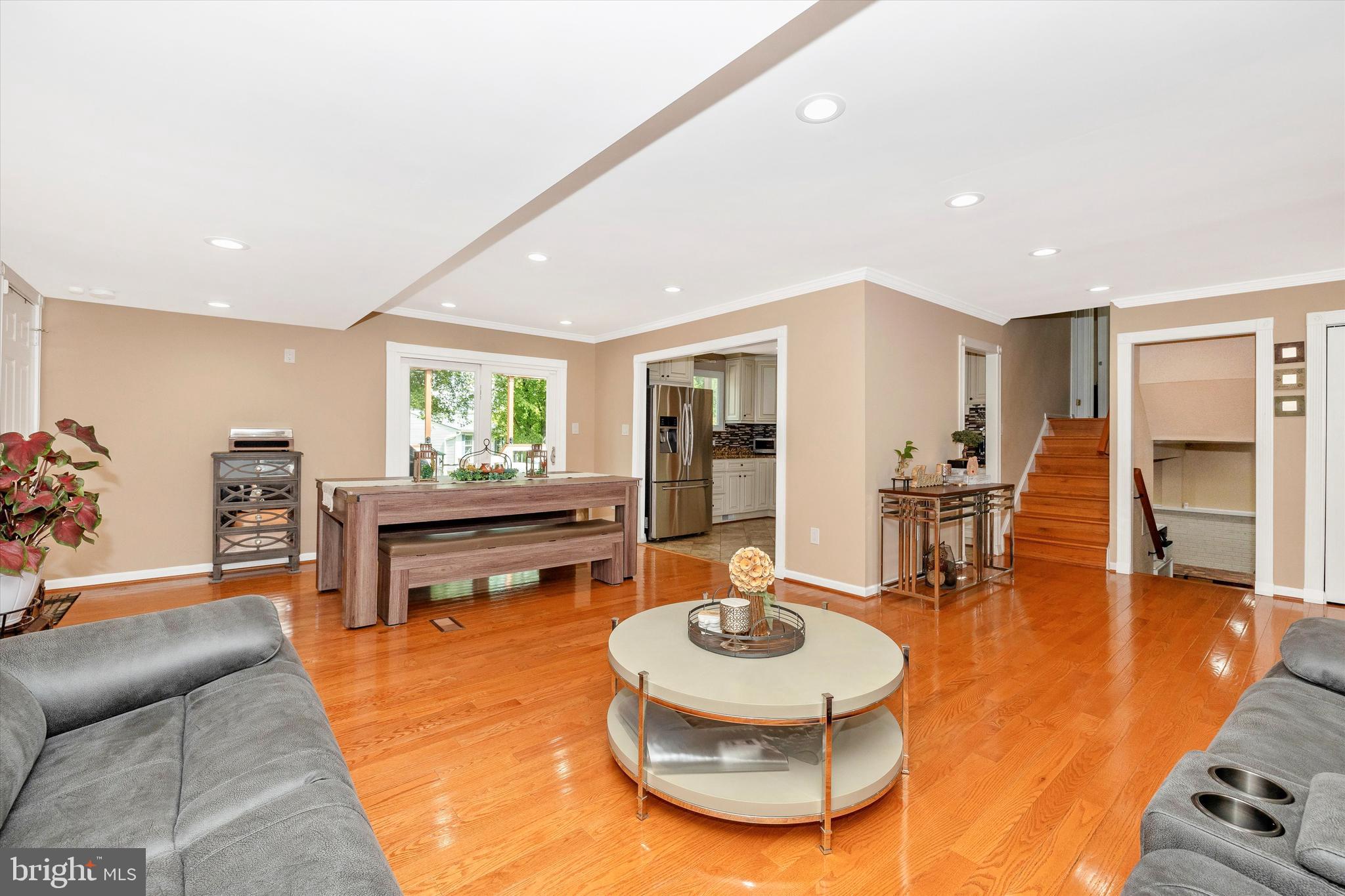 10319 Bloom Drive Damascus, MD 20872 - Photo 5 of 42 Peeking into the kitchen and back yard