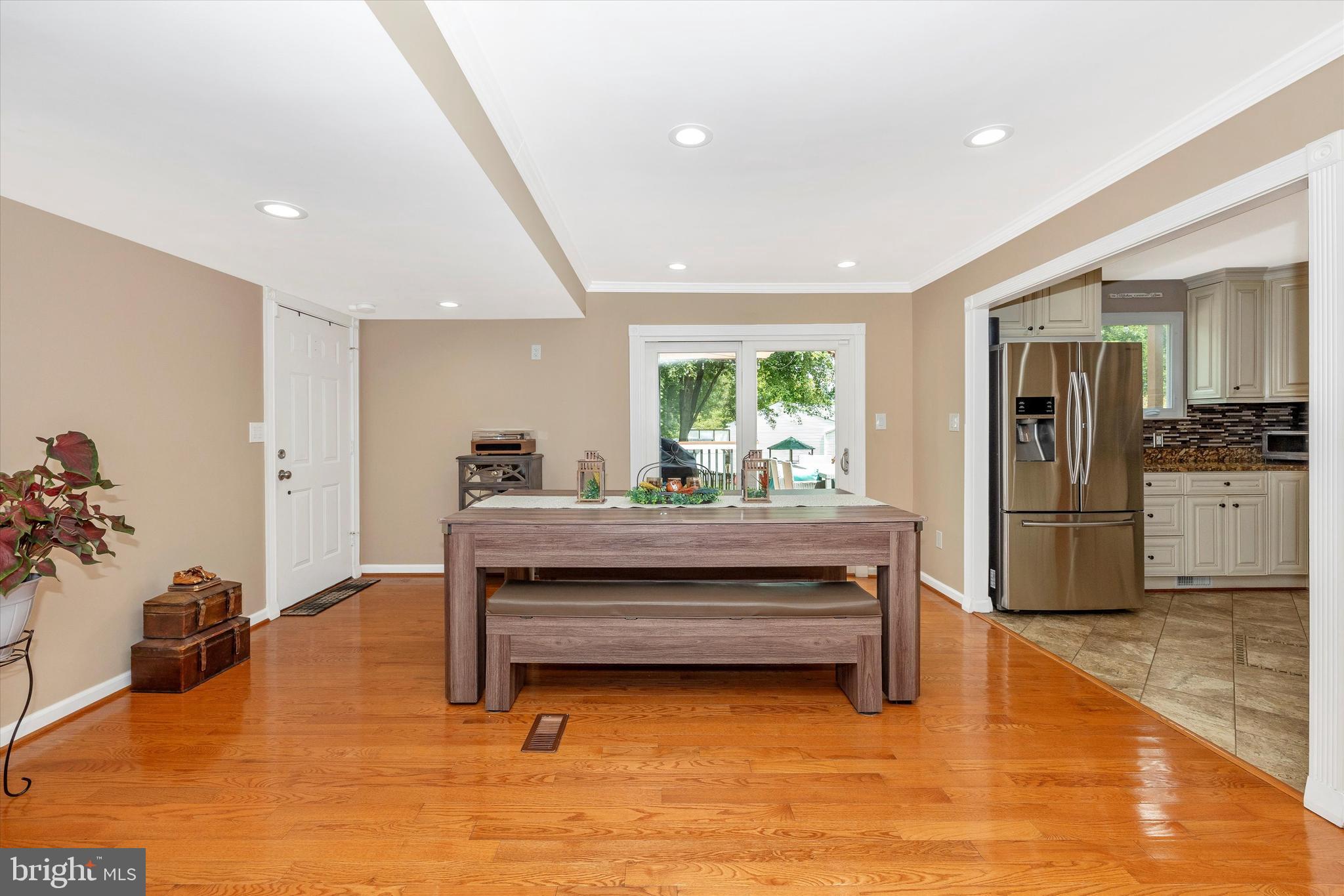 10319 Bloom Drive Damascus, MD 20872 - Photo 8 of 42 Large dining room area with glass doors to deck