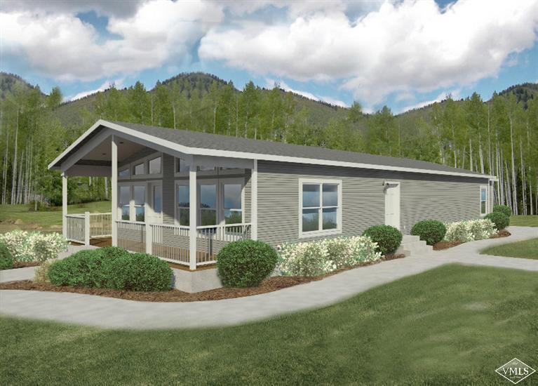 66 Bluegill Loop Gypsum, CO 81637 - Photo 1 of 4 a view of a yard in front of house