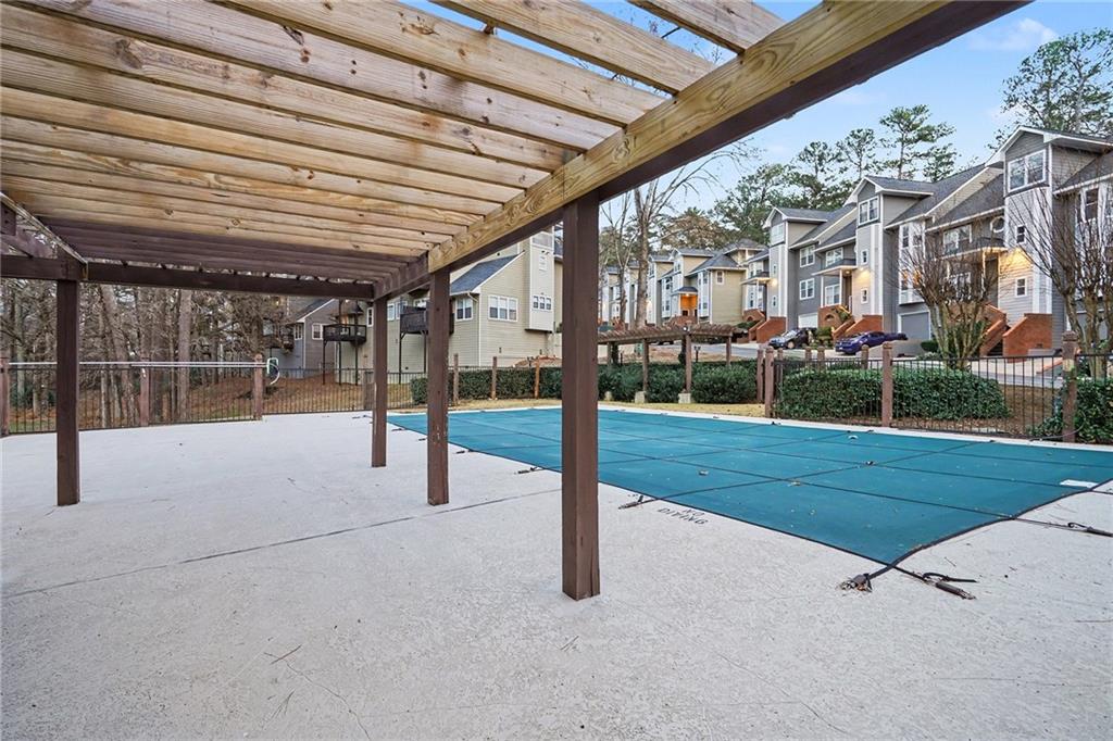 106 Ivy Green Lane Southeast Marietta, GA 30067 - Photo 19 of 20 a view of a house with backyard porch and garden