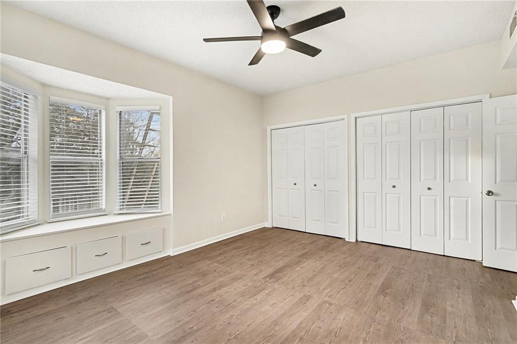 106 Ivy Green Lane Southeast Marietta, GA 30067 - Photo 10 of 20 a view of an empty room with a window