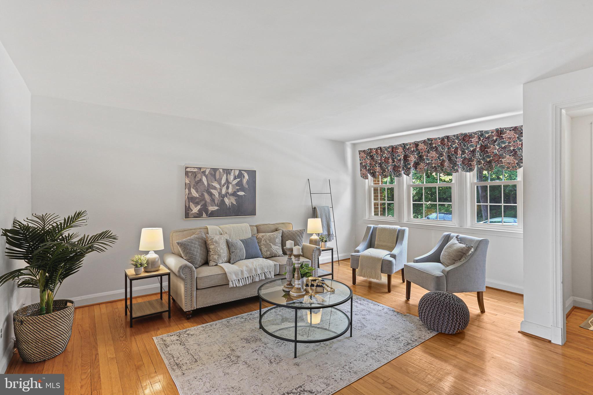 413 Whitfield Road Catonsville, MD 21228 - Photo 4 of 33 Spacious LR with exposed solid wood floors