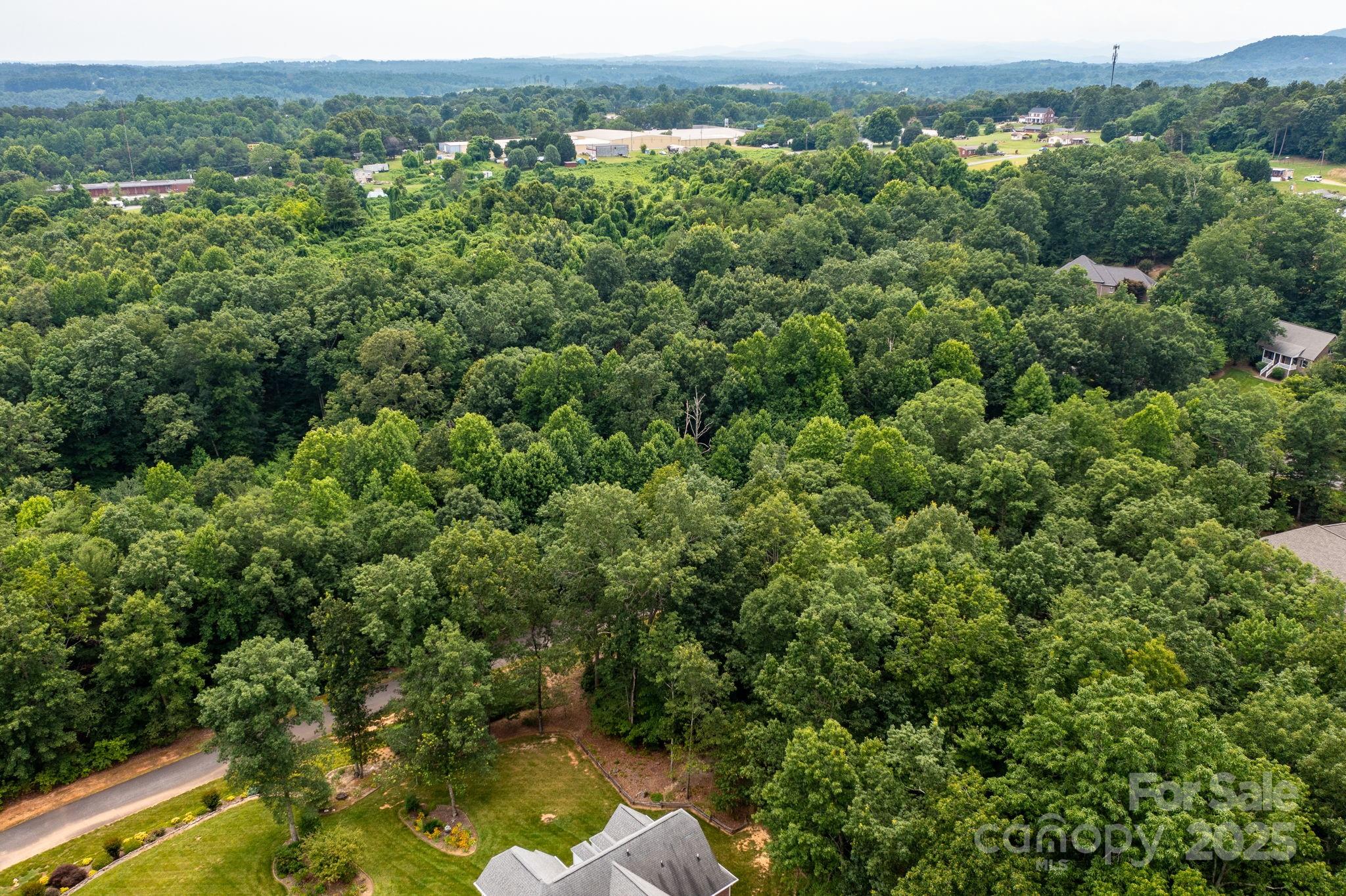 351 I-40 Access Road Hildebran, NC 28637 - Photo 13 of 36 an aerial view of a house with a yard