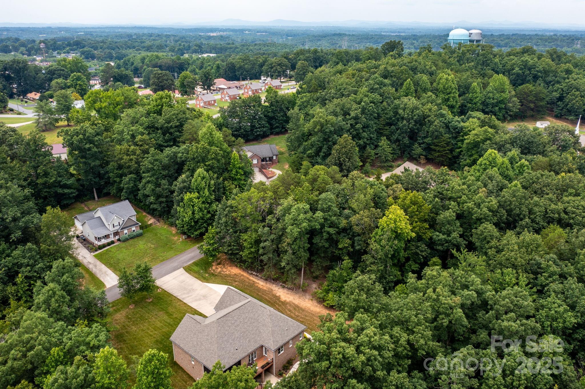 351 I-40 Access Road Hildebran, NC 28637 - Photo 19 of 36 an aerial view of a house with a yard