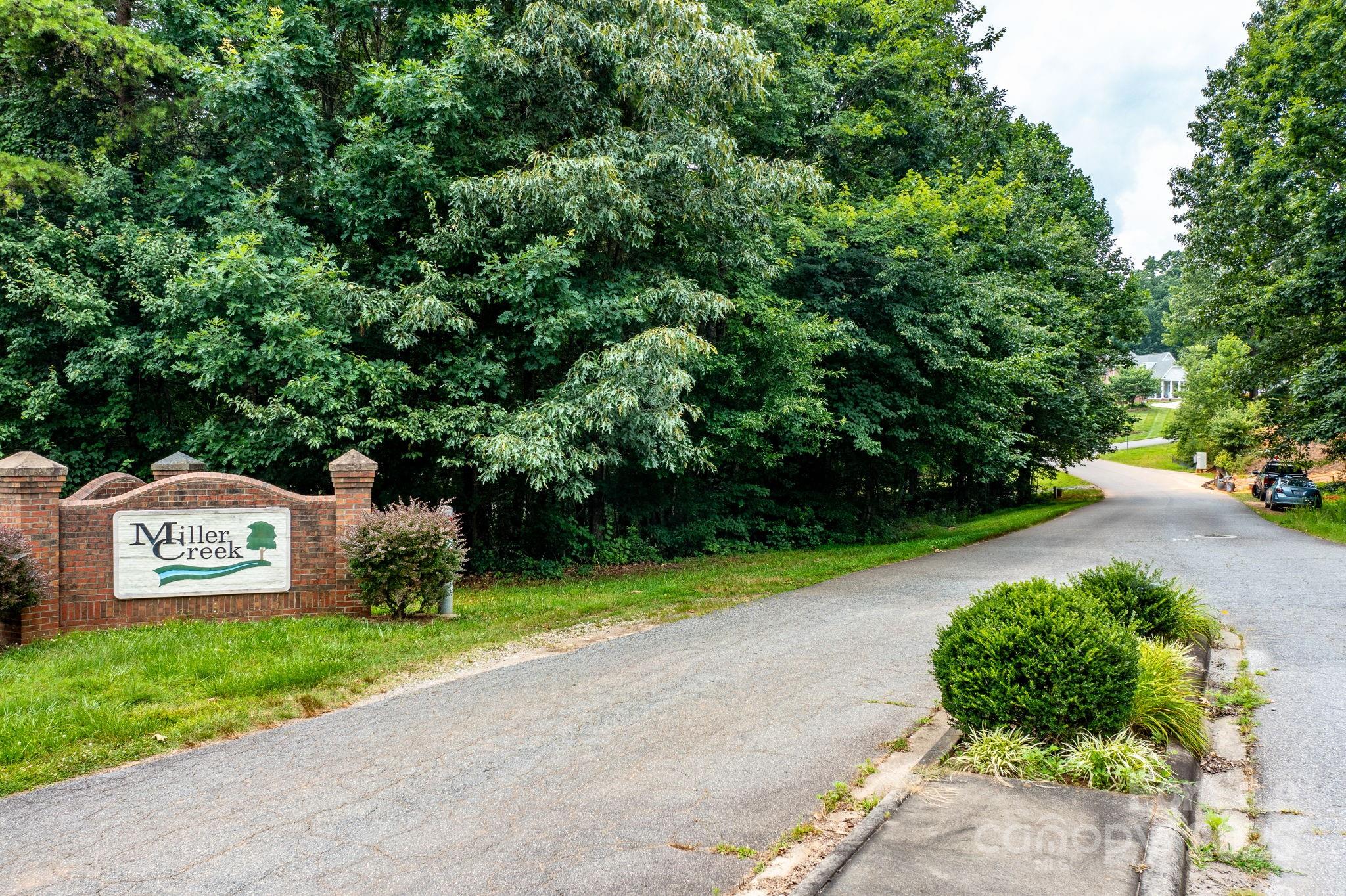 351 I-40 Access Road Hildebran, NC 28637 - Photo 6 of 36 a front view of a house with garden