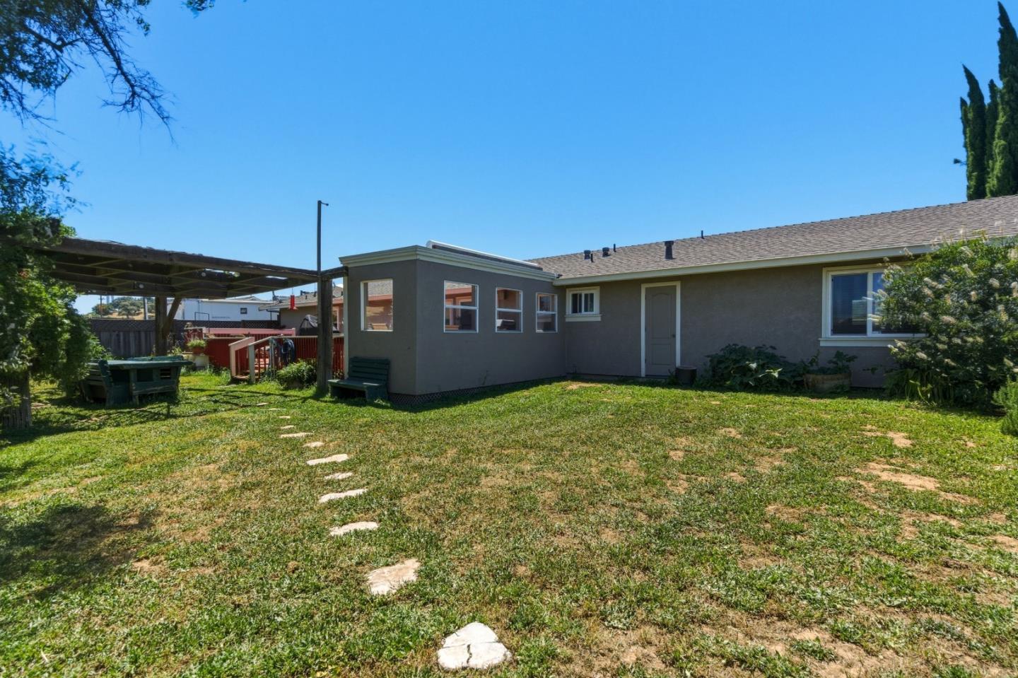 38780 Dinosaur Point Road Hollister, CA 95023 - Photo 13 of 34 a view of a house with a garden