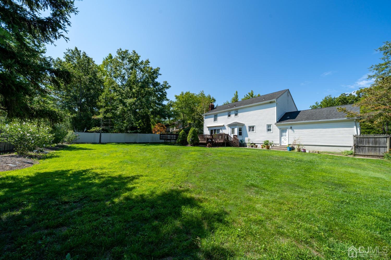 465 Cottrell Road Old Bridge, NJ 08857 - Photo 31 of 45 a front view of a house with garden