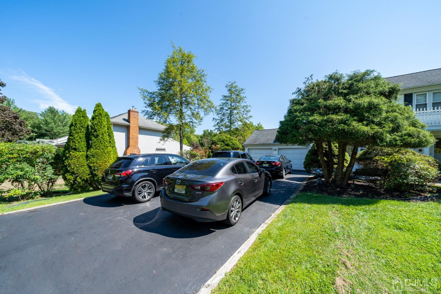 465 Cottrell Road Old Bridge, NJ 08857 - Photo 41 of 45 a view of a car is parked in the yard