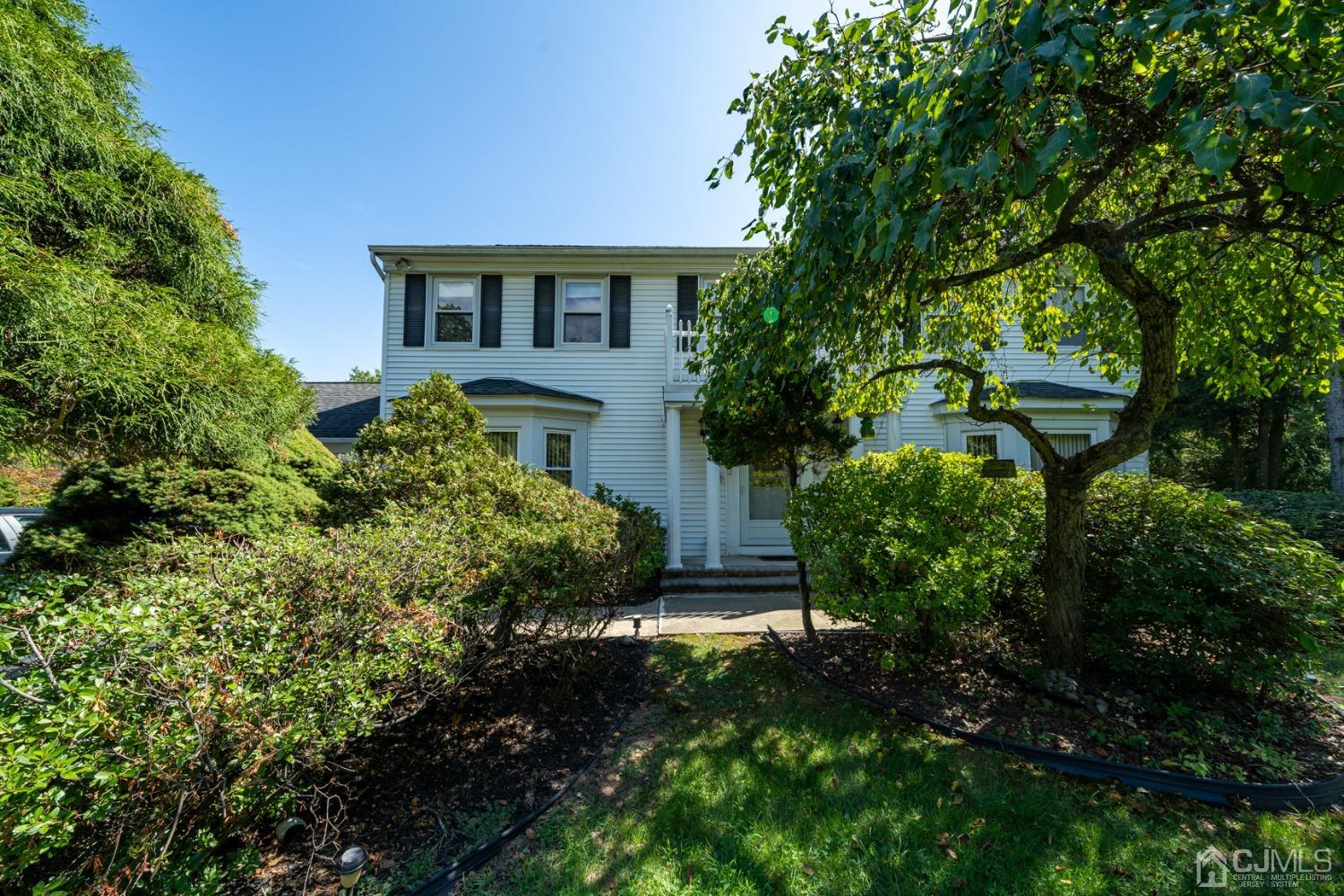 465 Cottrell Road Old Bridge, NJ 08857 - Photo 42 of 45 a view of a house with a yard and potted plants