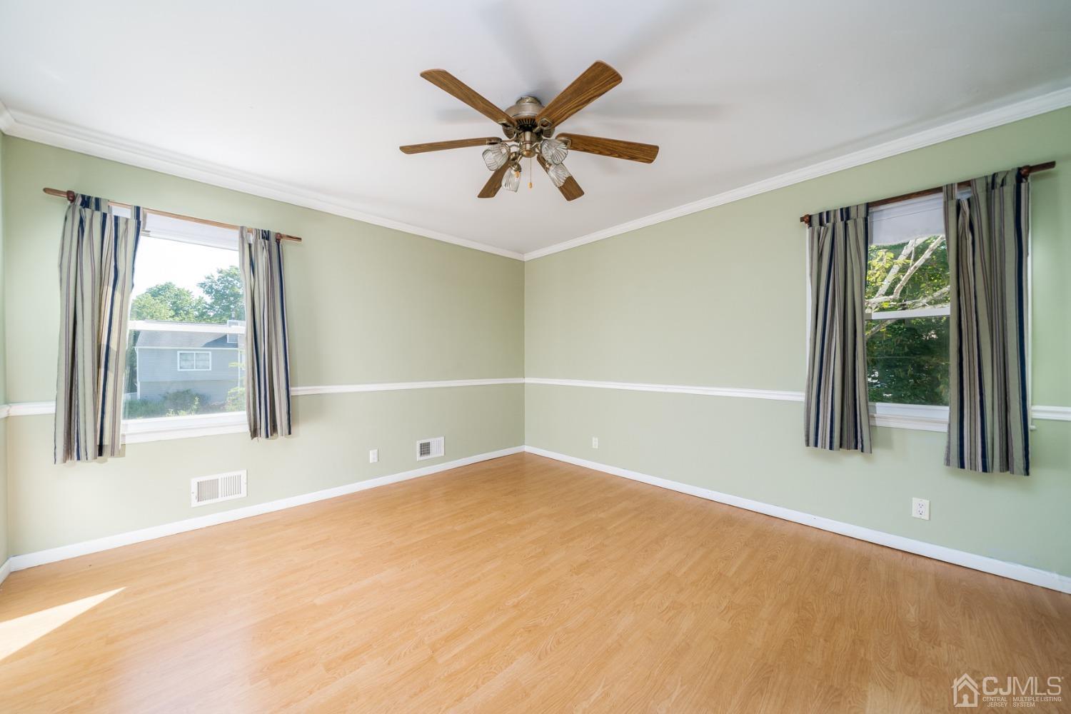 465 Cottrell Road Old Bridge, NJ 08857 - Photo 9 of 45 a view of an empty room with a window