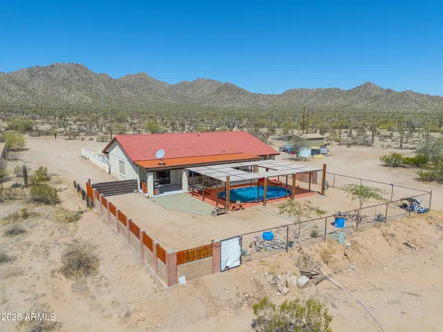 an aerial view of residential houses and wooden deck