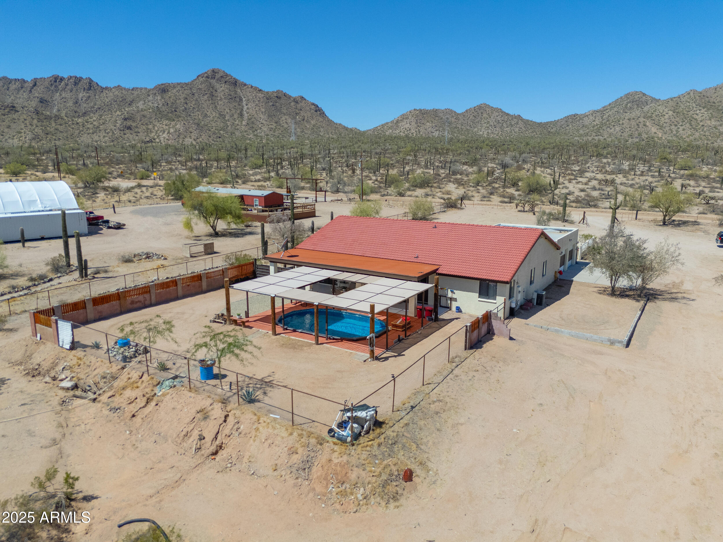 209 South Hidden Valley Road Maricopa, AZ 85139 - Photo 30 of 39 a view of a terrace with a mountain