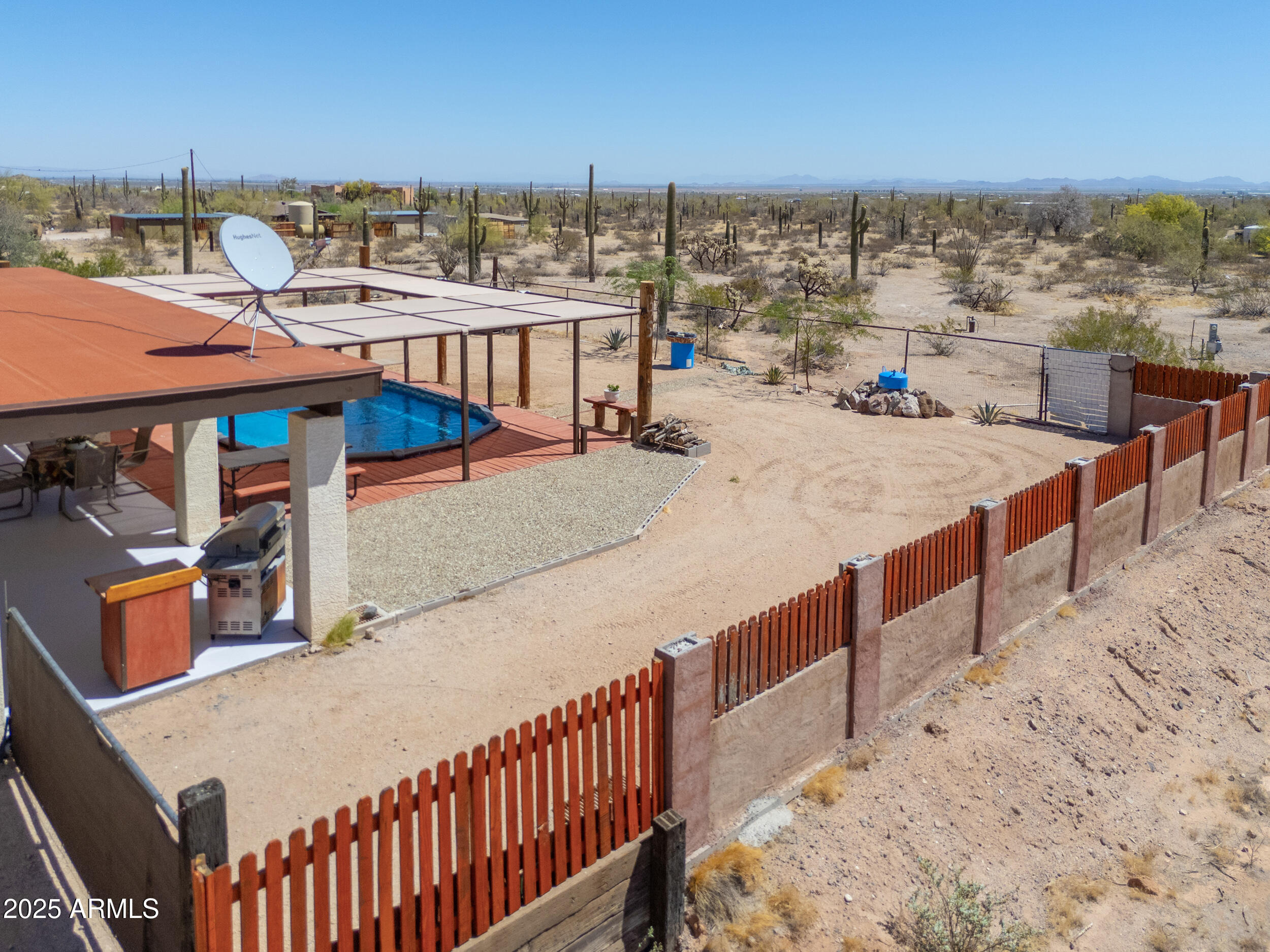 209 South Hidden Valley Road Maricopa, AZ 85139 - Photo 31 of 39 a view of roof deck with patio