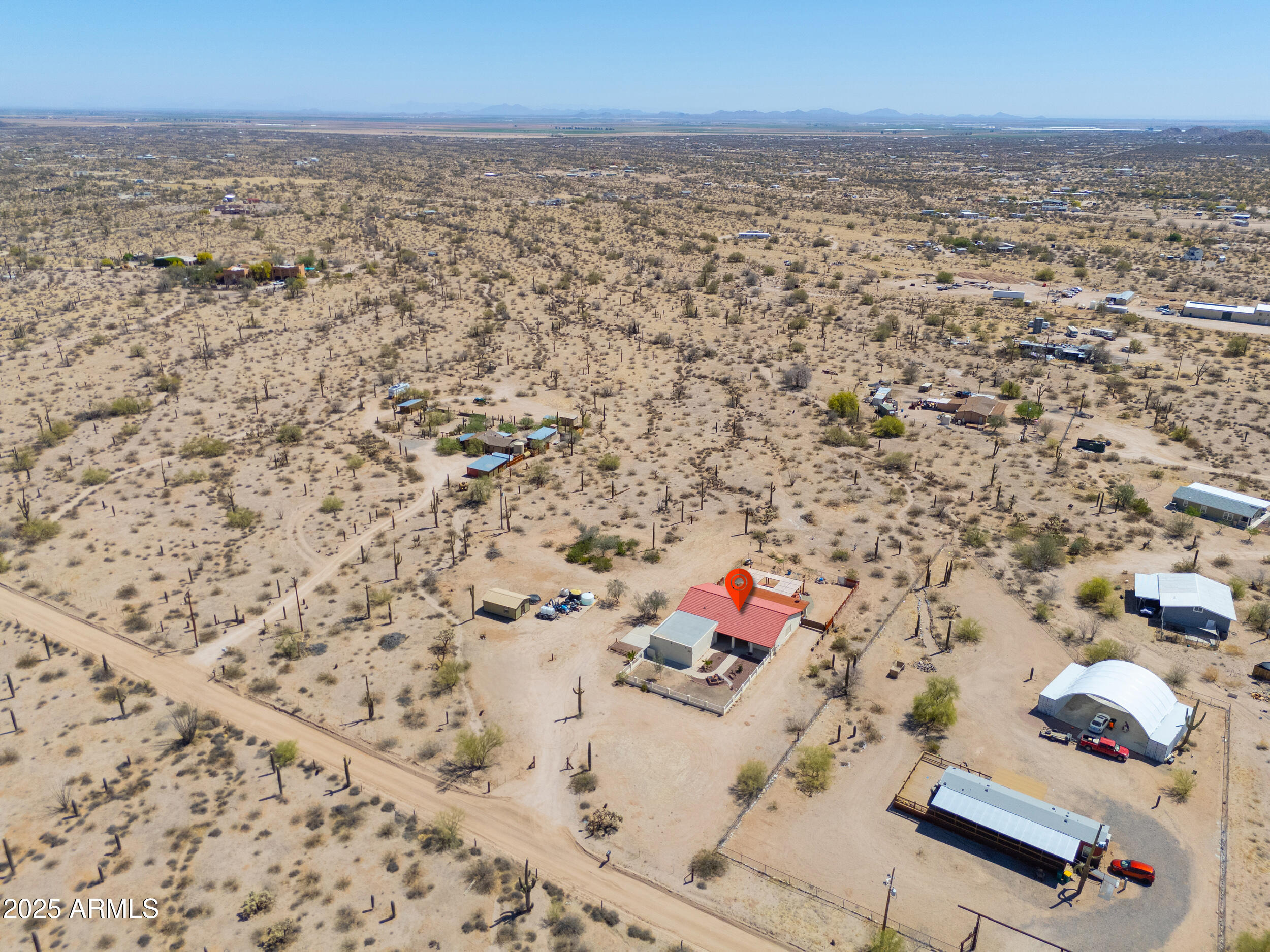 209 South Hidden Valley Road Maricopa, AZ 85139 - Photo 36 of 39 an aerial view of residential houses with outdoor space