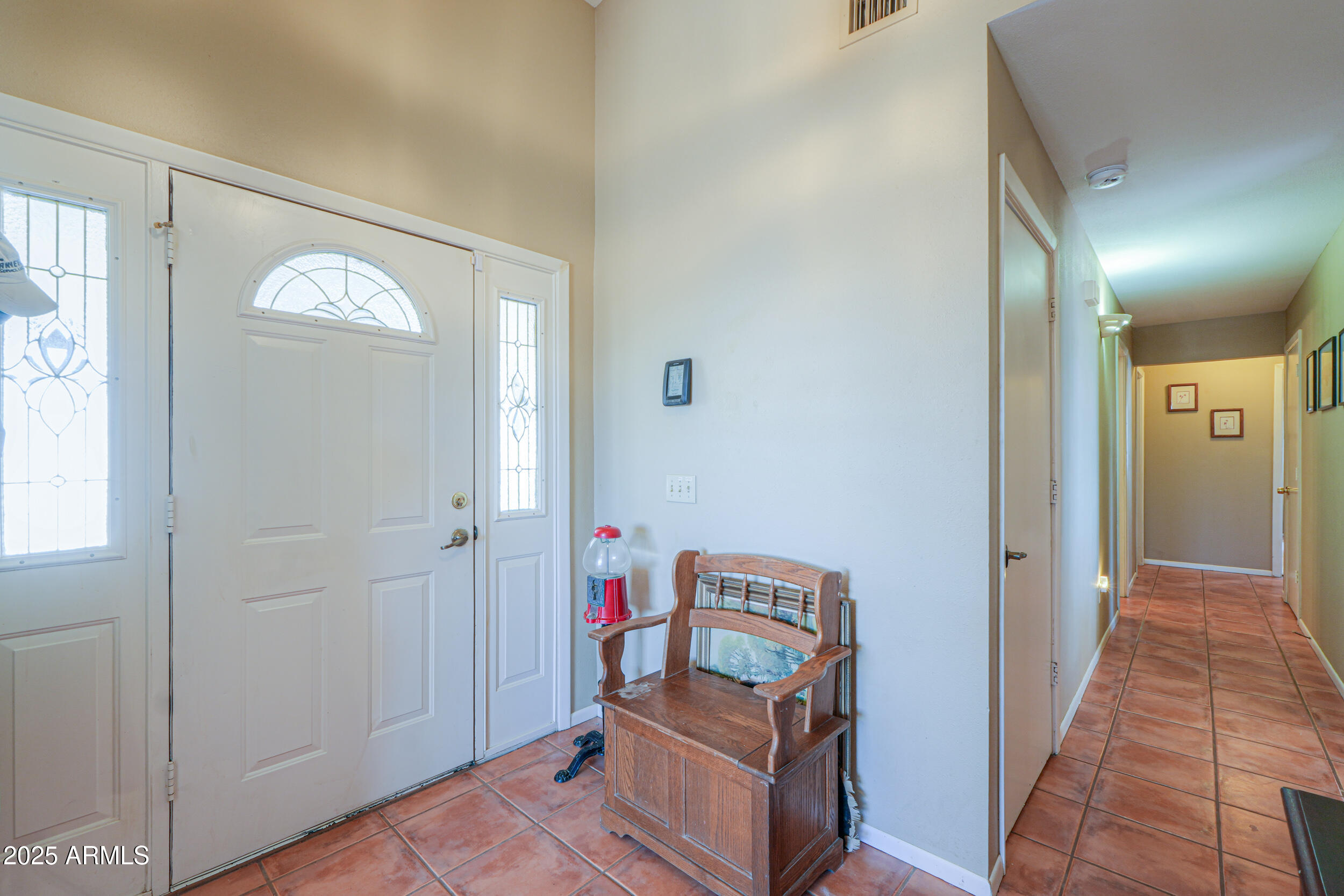 209 South Hidden Valley Road Maricopa, AZ 85139 - Photo 7 of 39 a view of a hallway with elevator
