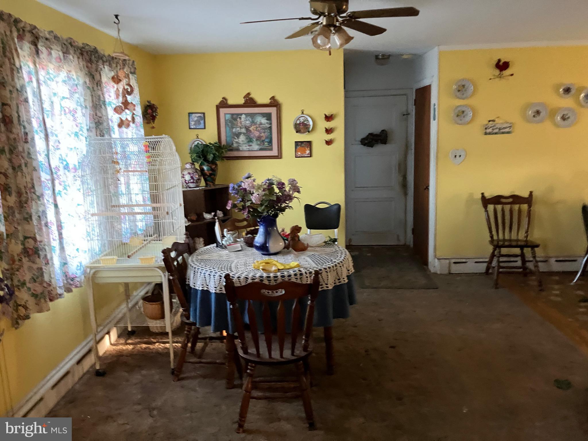 725 Marticville Road Pequea, PA 17565 - Photo 14 of 27 a view of a dining room with furniture and a window