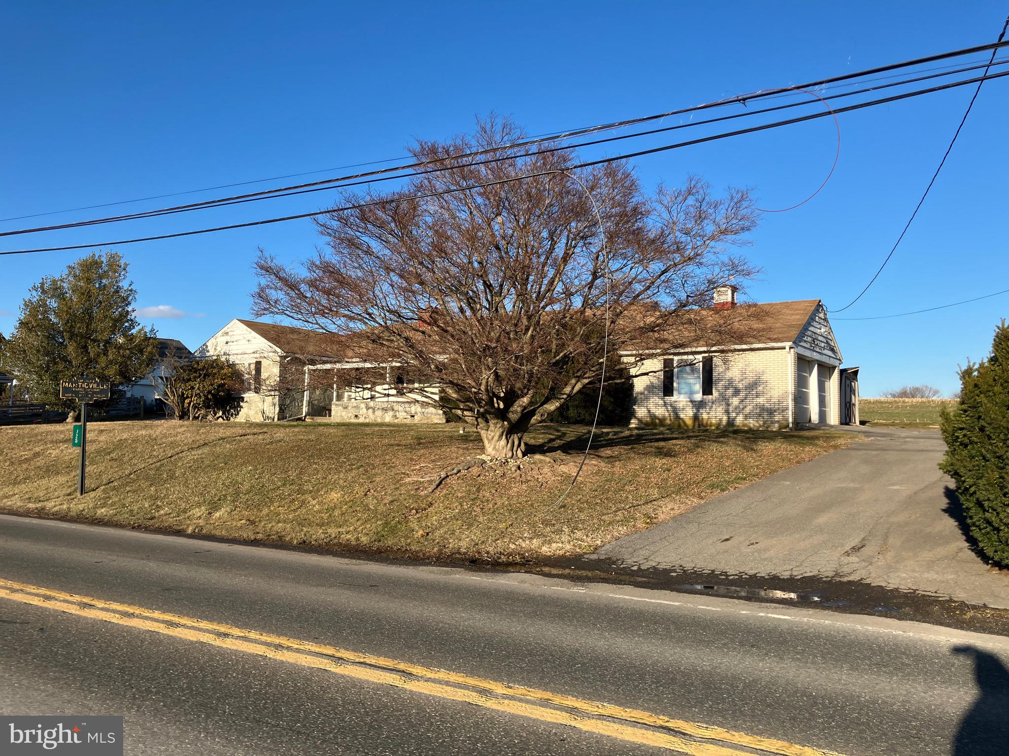 725 Marticville Road Pequea, PA 17565 - Photo 2 of 27 a view of a house with a yard