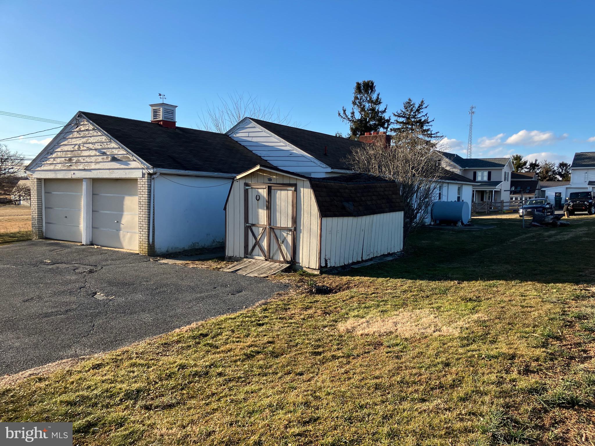 725 Marticville Road Pequea, PA 17565 - Photo 4 of 27 a front view of a house with a yard