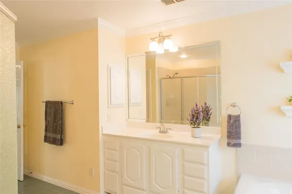 a bathroom with a bathtub and a sink