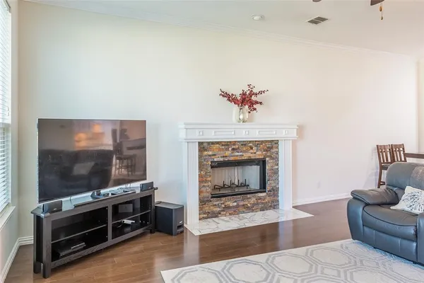 a kitchen with a dining table chairs and entryway