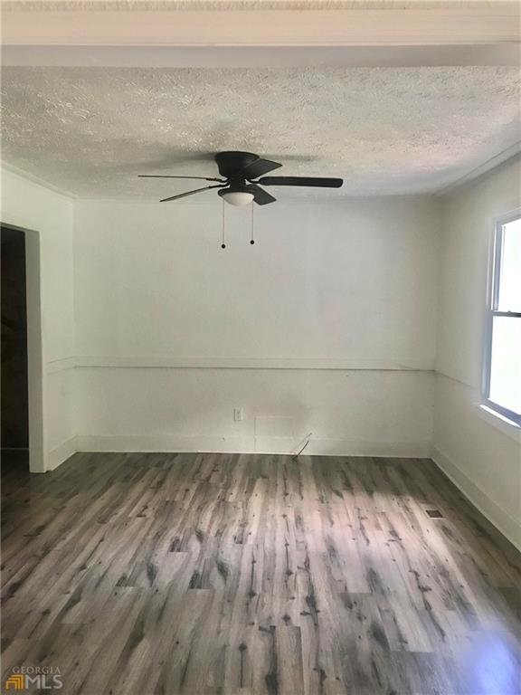 116 Edwards Street Bremen, GA 30110 - Photo 27 of 33 wooden floor in an empty room