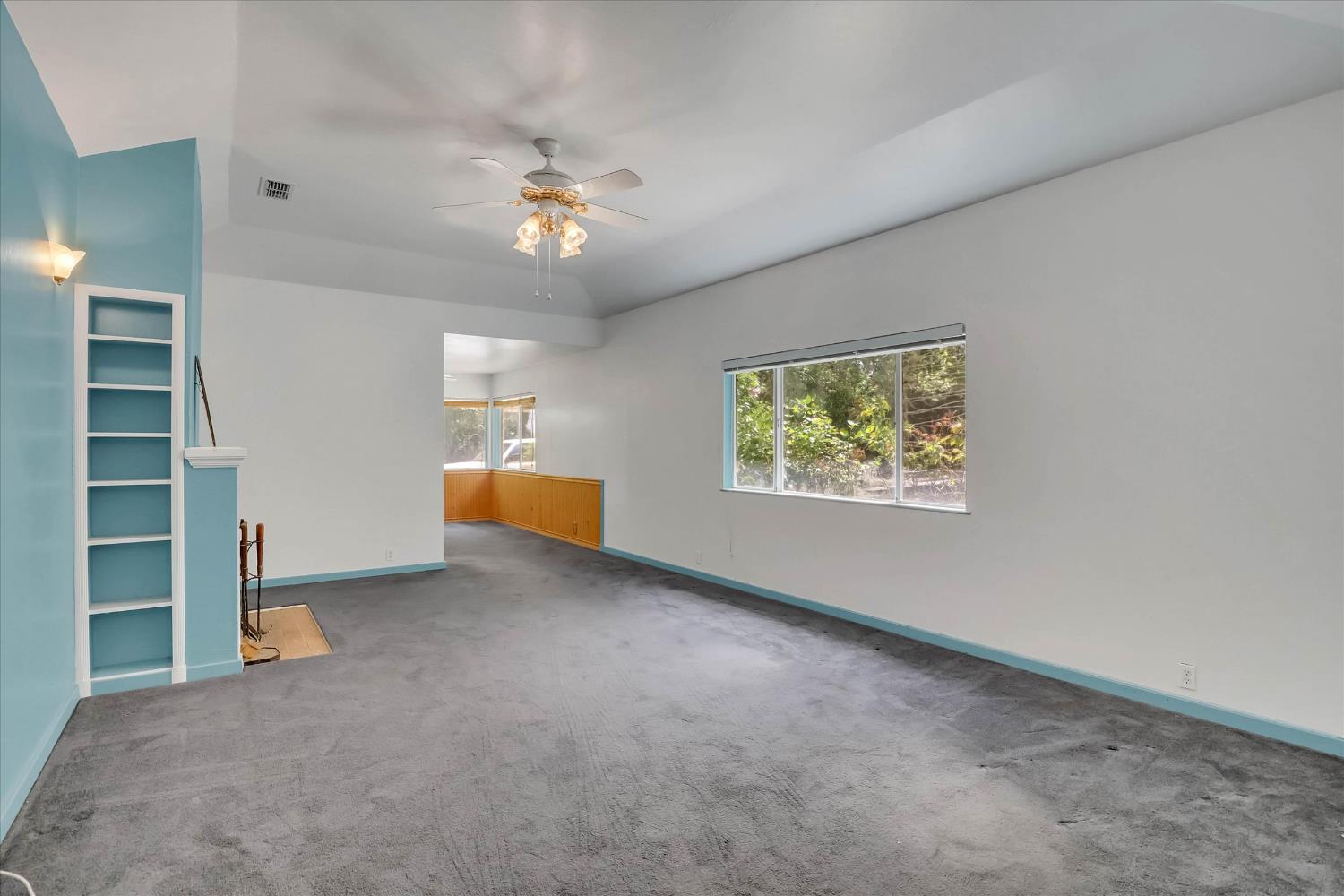 39640 South River Road Clarksburg, CA 95612 - Photo 3 of 25 wooden floor in an empty room with a window