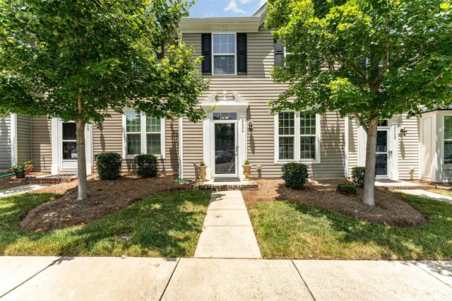 a backyard of a house with seating space