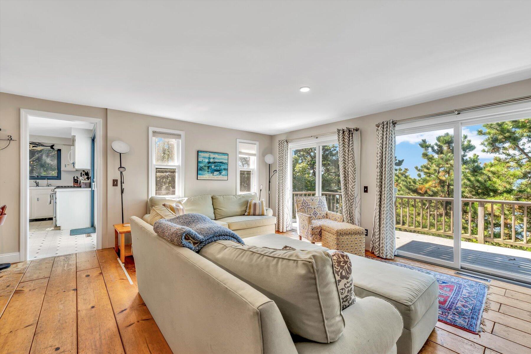 90 Ring Road Wellfleet, MA 02667 - Photo 15 of 86 a living room with furniture and a large window