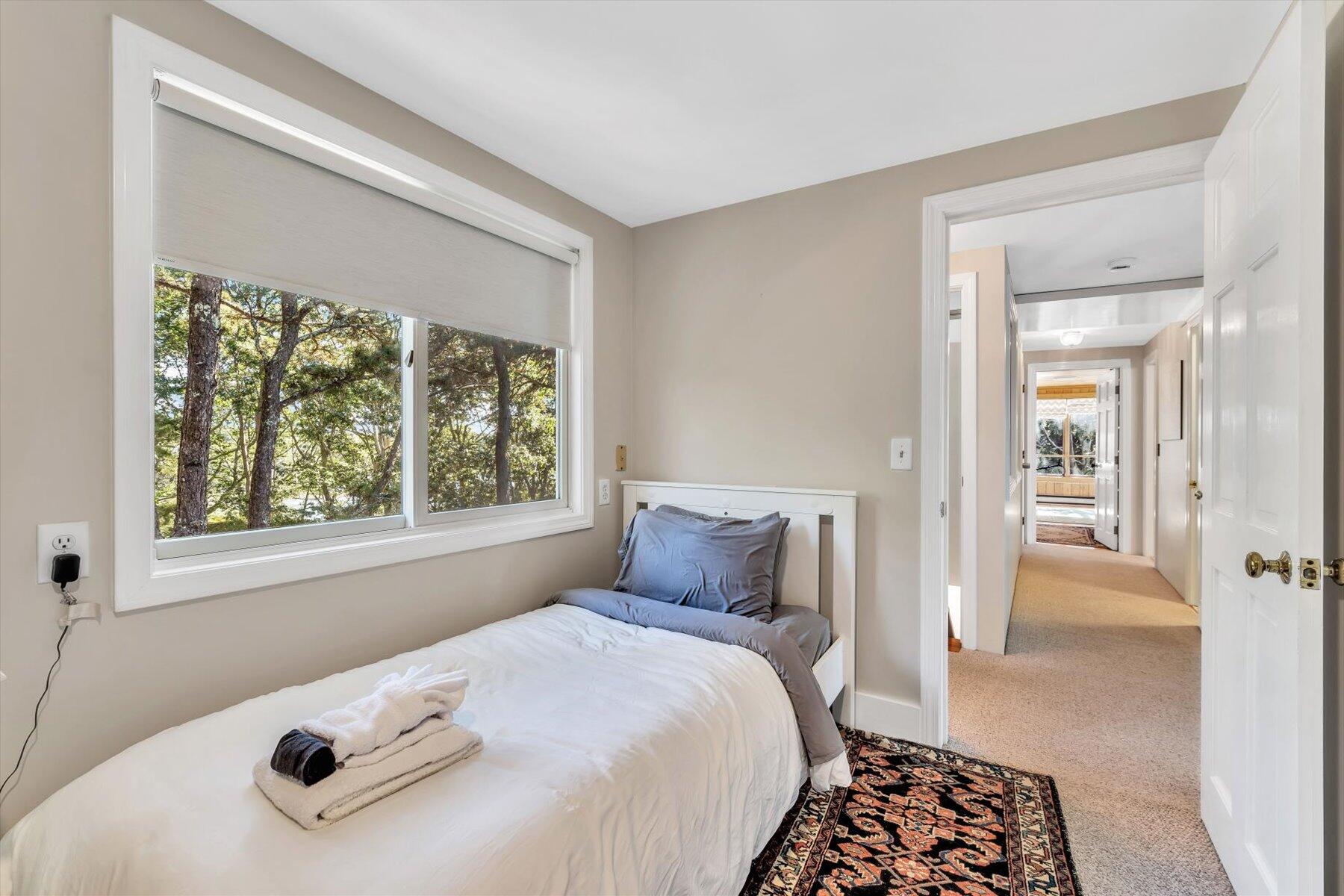 90 Ring Road Wellfleet, MA 02667 - Photo 40 of 86 a bedroom with a bed and a window