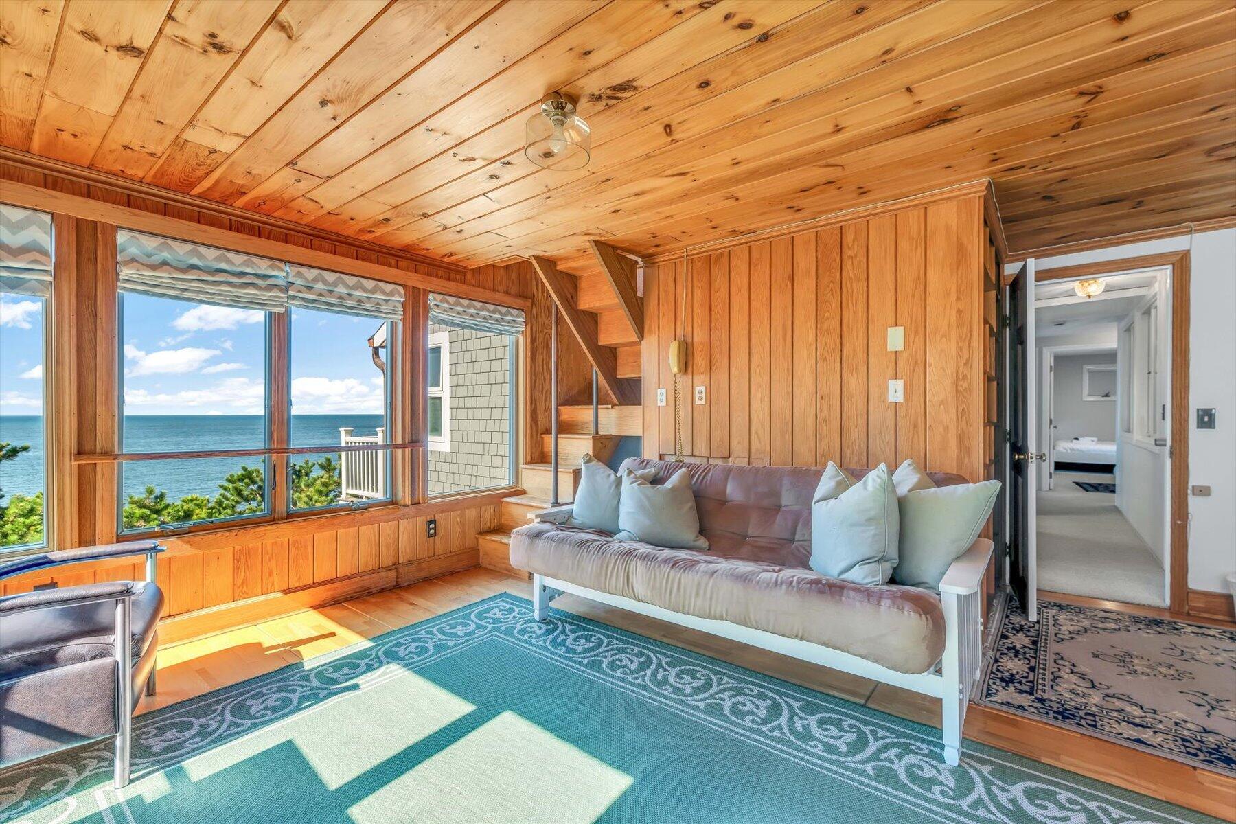 90 Ring Road Wellfleet, MA 02667 - Photo 47 of 86 a living room with furniture and a rug