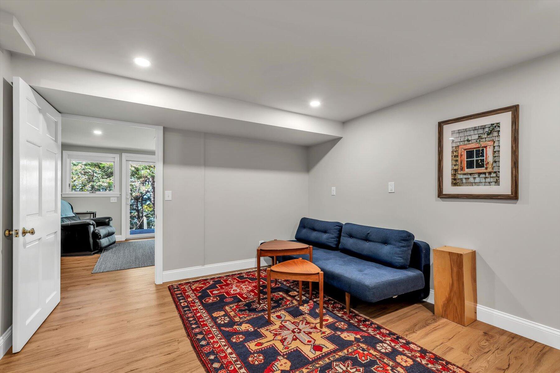 90 Ring Road Wellfleet, MA 02667 - Photo 52 of 86 a living room with furniture or couch and a wooden floor