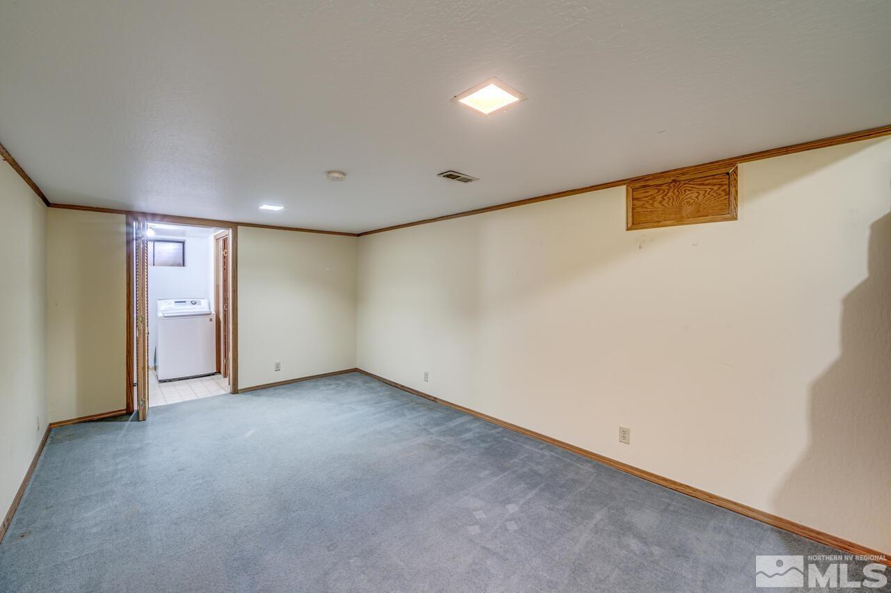 1950 Wren Street Reno, NV 89509 - Photo 11 of 24 an empty room with a empty space and windows