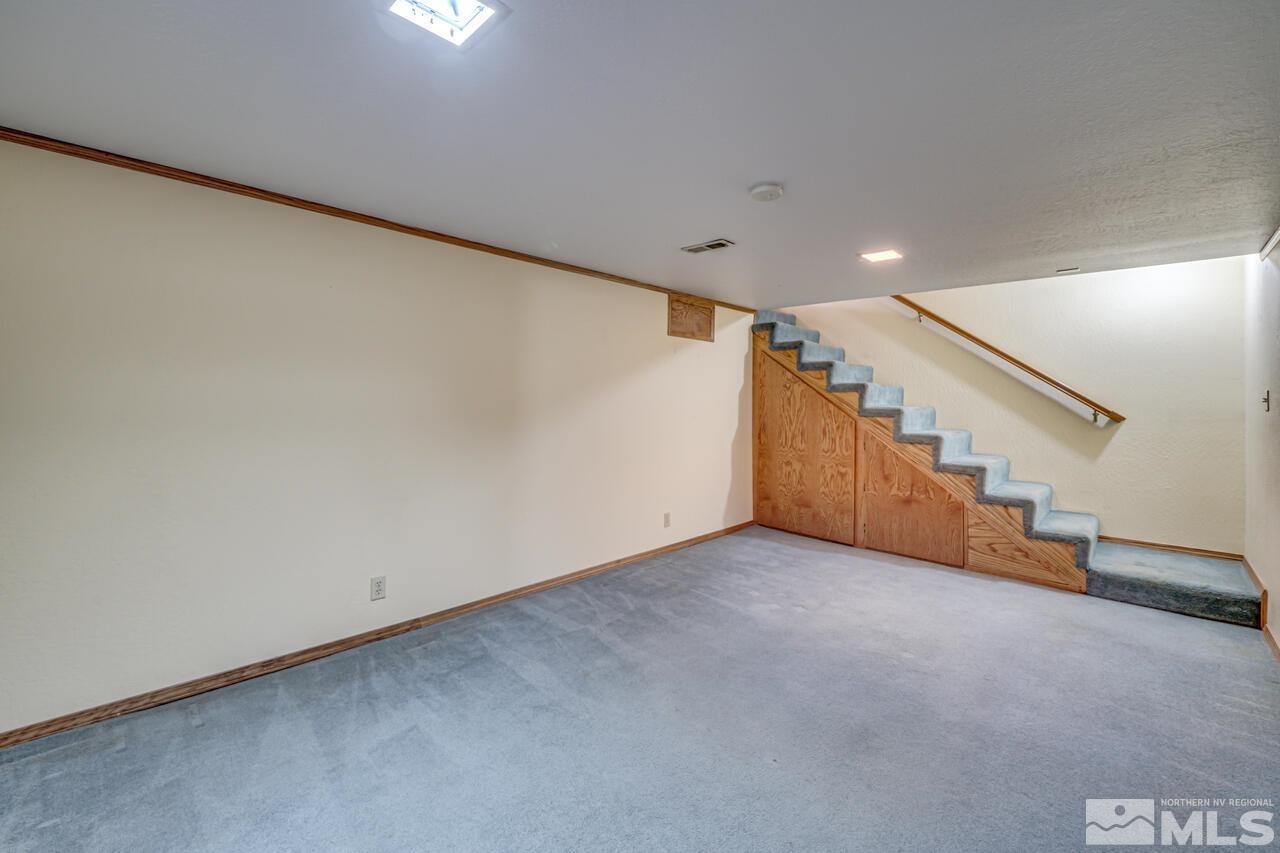 1950 Wren Street Reno, NV 89509 - Photo 12 of 24 a view of an empty room with stairs