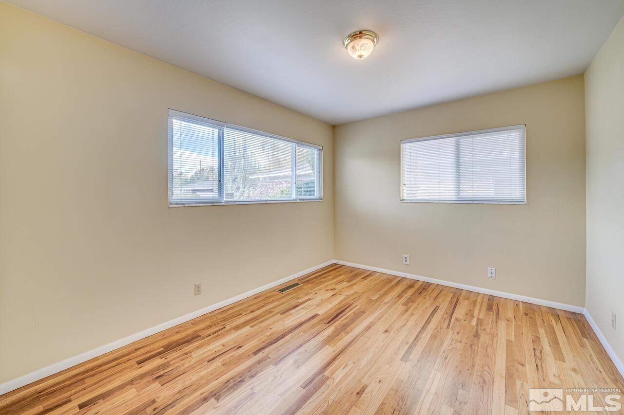 1950 Wren Street Reno, NV 89509 - Photo 17 of 24 a view of empty room with wooden floor