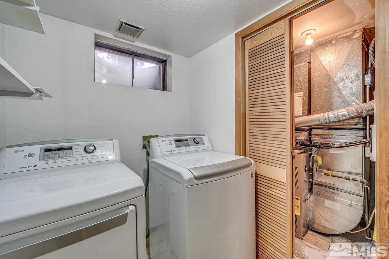 1950 Wren Street Reno, NV 89509 - Photo 20 of 24 a utility room with dryer and washer